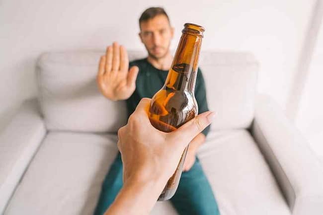 Man Saying No To Alcohol natural remedies for stress and anxiety