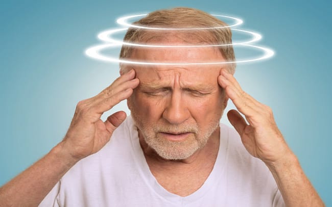 man with vertigo and head is spinning home remedies for vertigo